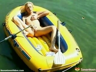 Adorable eighteen teenage rubs one out on a raft